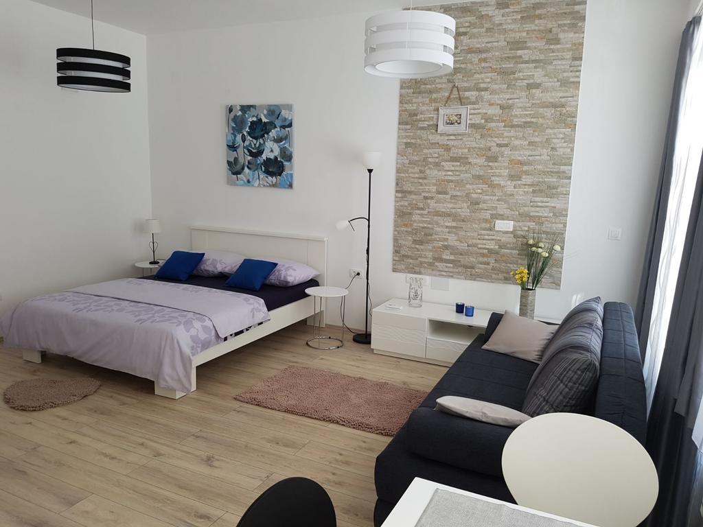 Studio met Kingsize Bed en Slaapbank